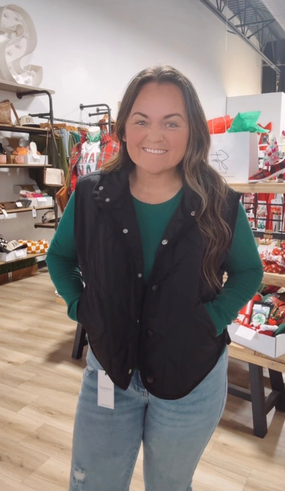 Black quilted puffer snap vest