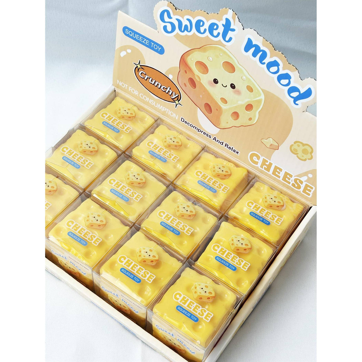 Crunchy and scented Cheese Cube Squishy Toy
