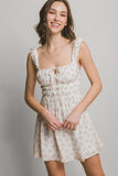 Fiona’s floral scrunchie dress