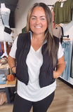 Reversible plaid puffer vest