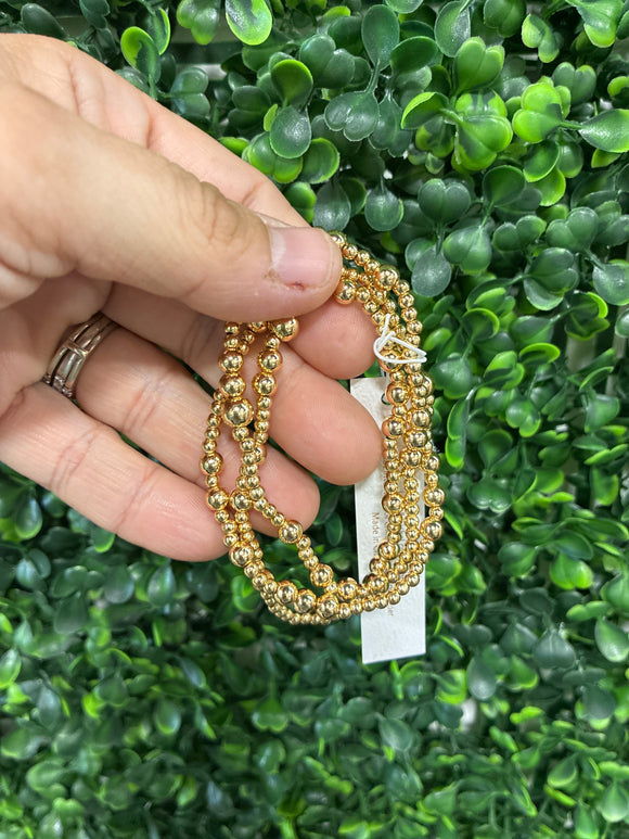 Multi layered gold ball stretch chain bracelets