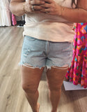 Kinley’s light wash distressed shorts
