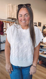 Callie’s cable knit sweater vest