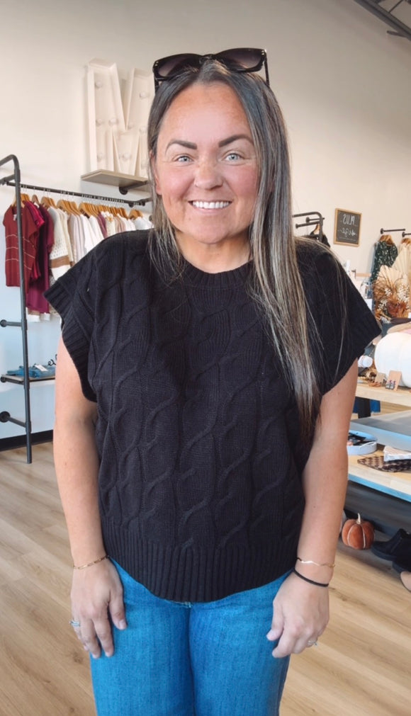 Callie’s cable knit sweater vest