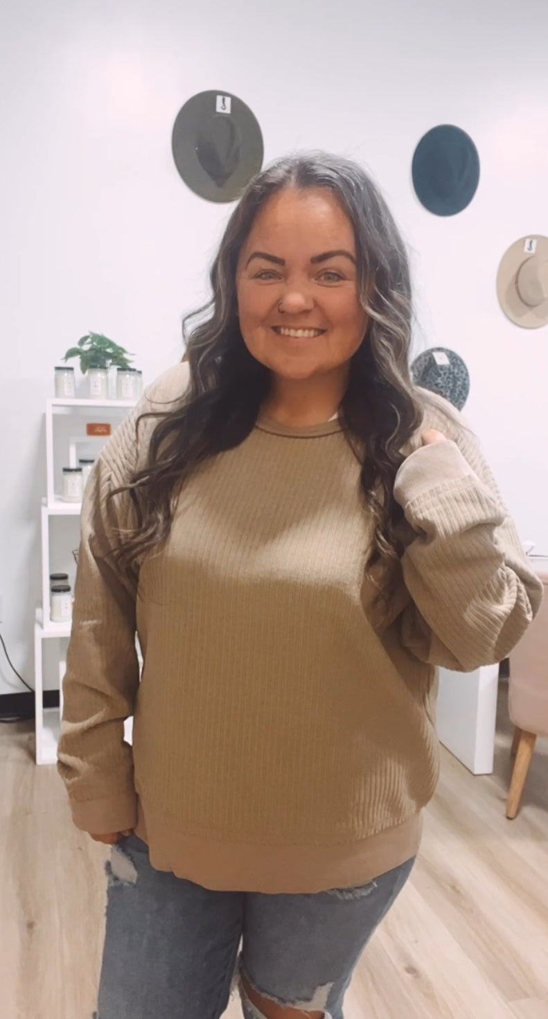 Olivia’s oversized soft ribbed pullover top