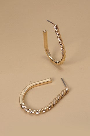 Half twist oval hoop earrings