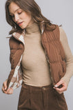 Reversible plaid puffer vest