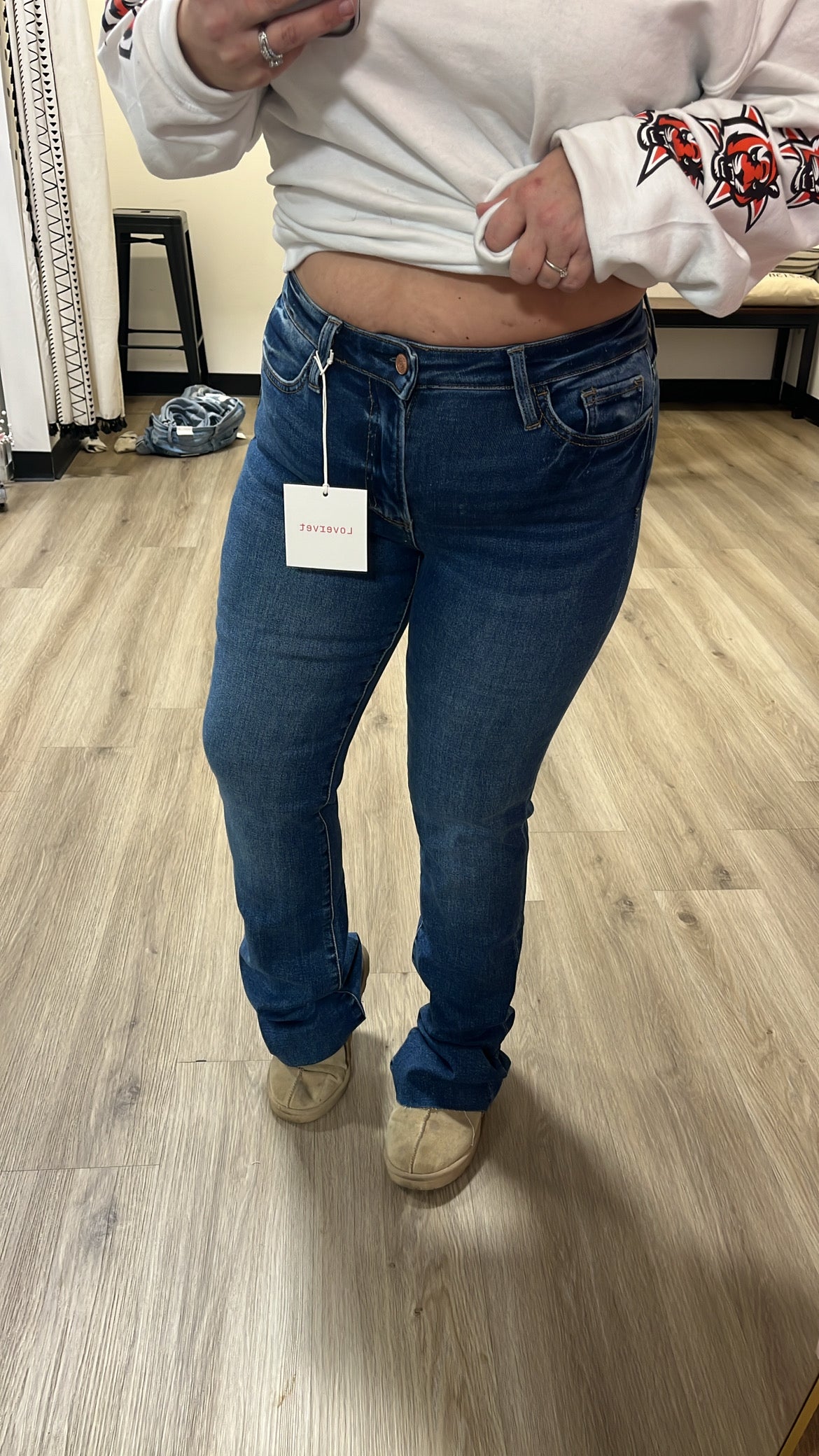 Haylie’s high rise slim bootcut raw hem jeans