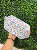 Floral quilted cosmetic pouch bag