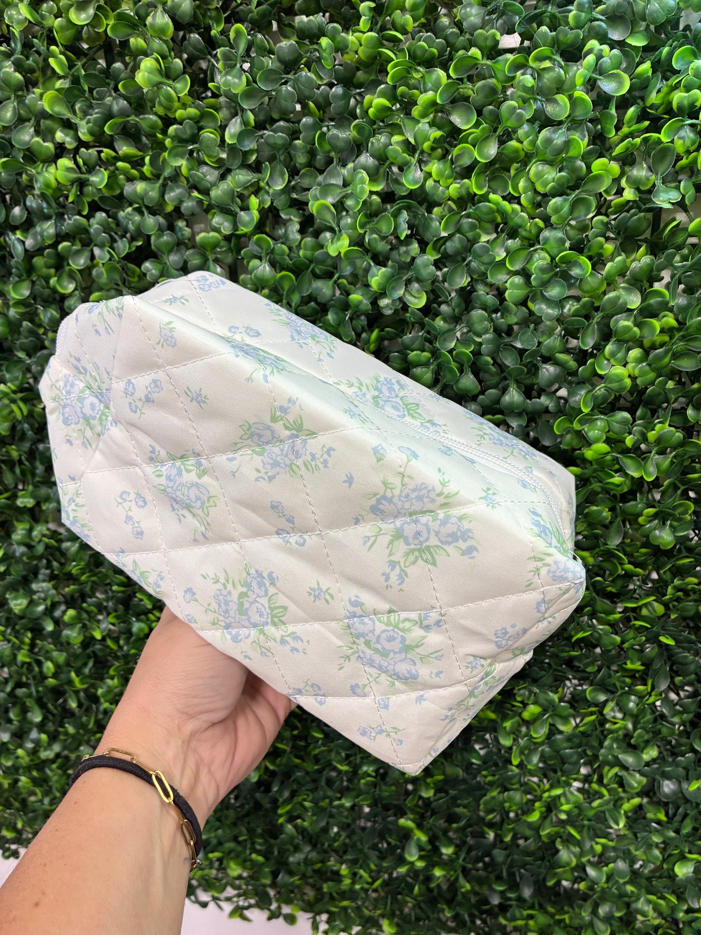 Floral quilted cosmetic pouch bag