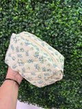 Floral quilted cosmetic pouch bag