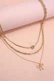 MULTI LAYER PEARL BOW CAHRM NECKLACE