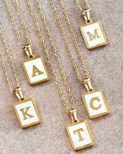 Gold initial tag necklace